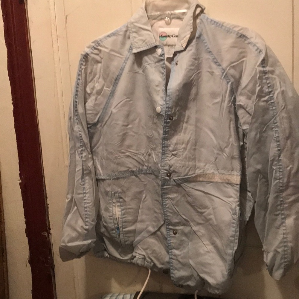 Light blue jacket.
